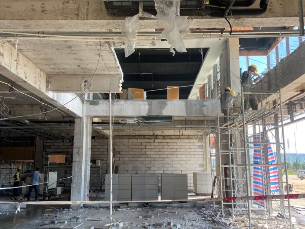 某酒店装修改造碳纤维粘钢包钢加固